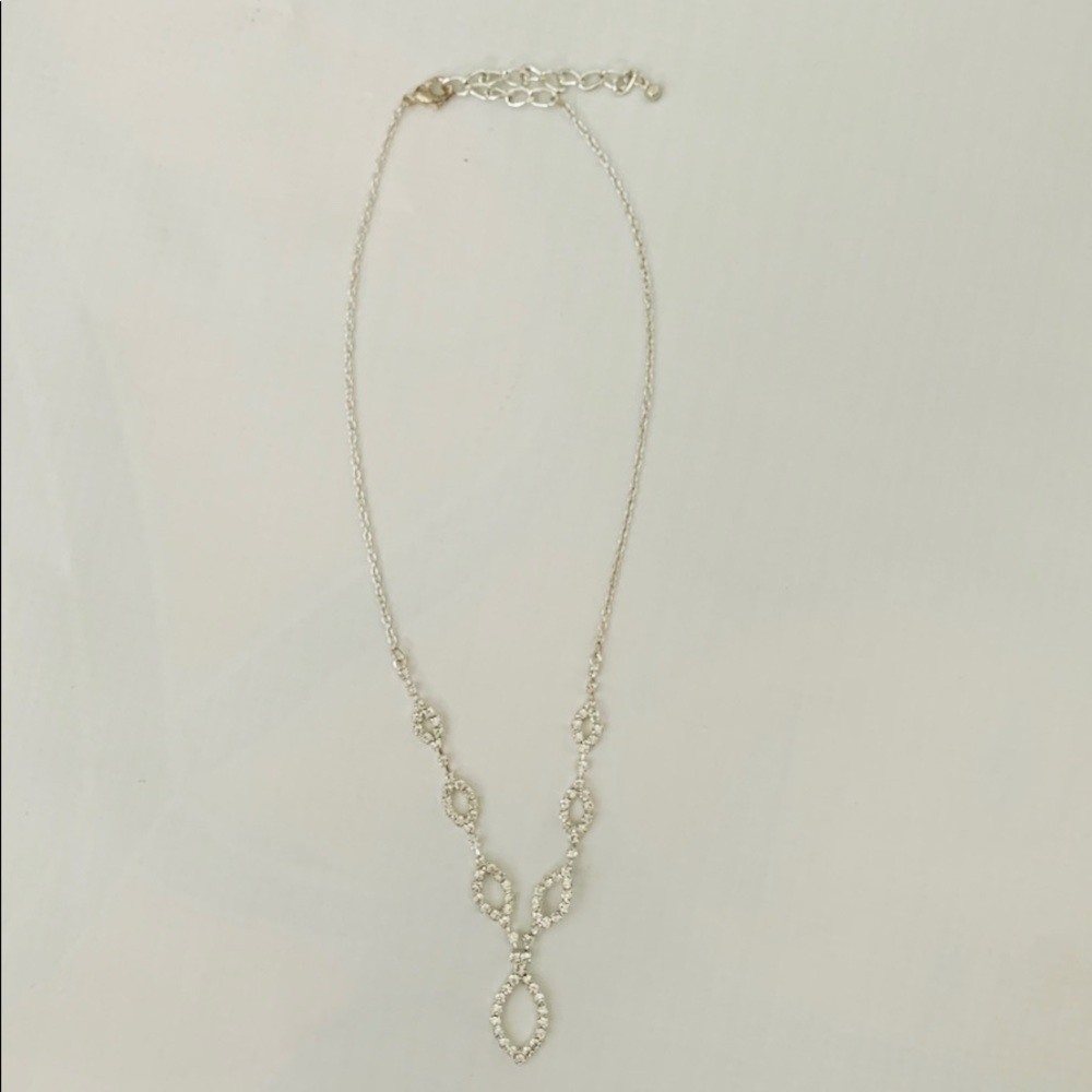 Silver necklace. Adjustable size but around 16”.